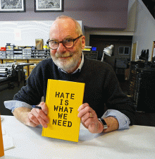 Ward Schumaker with his publication, Hate is What We Need, 2017